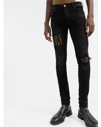 Мужские черные рваные зауженные джинсы от Amiri
