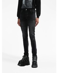 Мужские черные рваные зауженные джинсы от Amiri