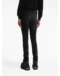 Мужские черные рваные зауженные джинсы от Amiri