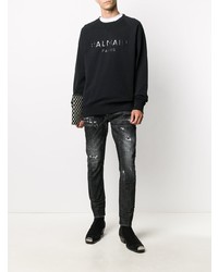 Мужские черные рваные зауженные джинсы от DSQUARED2