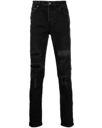 Мужские черные рваные зауженные джинсы от Ksubi