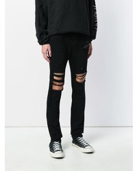 Мужские черные рваные зауженные джинсы от RtA