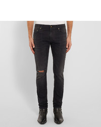 Мужские черные рваные зауженные джинсы от Saint Laurent