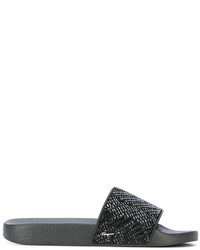 Черные сандалии на плоской подошве с украшением от Salvatore Ferragamo