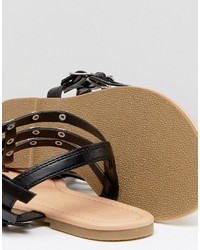 Черные сандалии на плоской подошве с шипами от Asos
