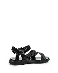 Черные сандалии на плоской подошве от Donna Moda