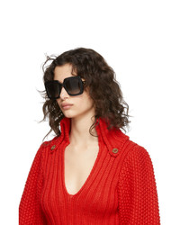 Женские черные солнцезащитные очки от Gucci
