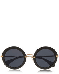 Женские черные солнцезащитные очки от Miu Miu