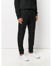Мужские черные спортивные штаны в вертикальную полоску от Love Moschino