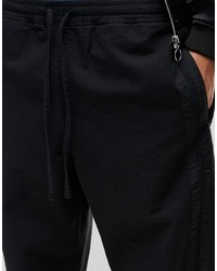 Мужские черные спортивные штаны в горизонтальную полоску от Asos