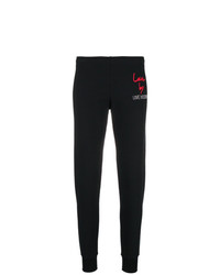 Женские черные спортивные штаны с принтом от Love Moschino