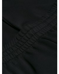 Женские черные спортивные штаны от MM6 MAISON MARGIELA