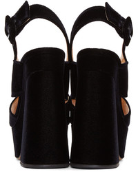 Черные туфли от Charlotte Olympia