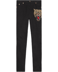 Черные узкие брюки с вышивкой от Gucci
