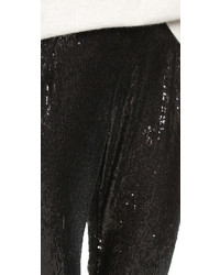 Черные узкие брюки с пайетками