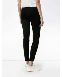 Черные узкие брюки от Moncler