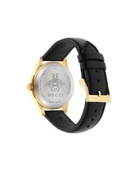 Женские черные часы от Gucci