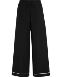 Черные шелковые широкие брюки от Valentino