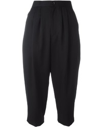 Женские черные шерстяные брюки со складками от Comme des Garcons
