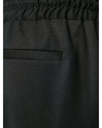 Мужские черные шерстяные брюки от Versus