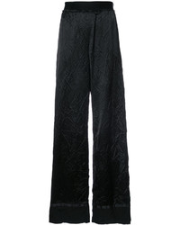 Черные шерстяные широкие брюки от Maison Margiela