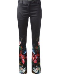 Черные широкие брюки с цветочным принтом от Roberto Cavalli