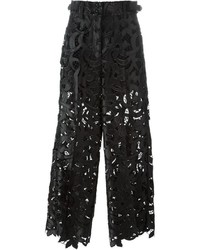 Черные широкие брюки с цветочным принтом от Sacai