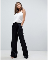 Черные широкие брюки с цветочным принтом от StyleStalker