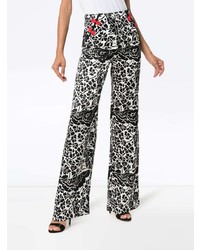 Черные широкие брюки с цветочным принтом от De La Vali