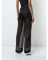 Черные широкие брюки от Maison Margiela