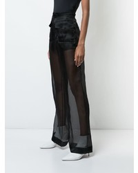 Черные широкие брюки от Maison Margiela