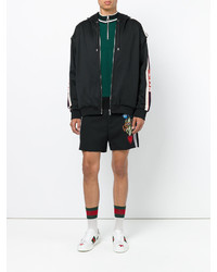 Мужские черные шорты с вышивкой от Gucci