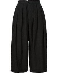 Женские черные шорты от Comme des Garcons