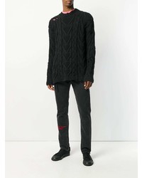 Мужской черный вязаный свитер от Palm Angels