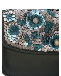 Черный клатч с пайетками с украшением от Coach