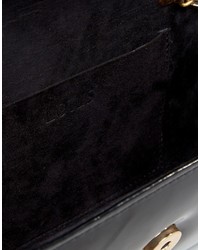 Черный клатч от Lotus