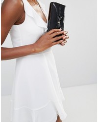 Черный клатч от Lotus