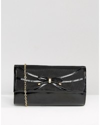 Черный клатч от Lotus