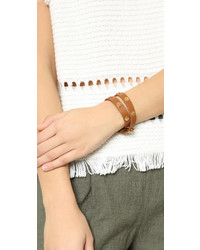 Черный кожаный браслет с шипами от Tory Burch