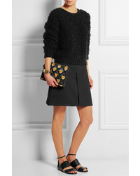 Черный кожаный клатч с принтом от Moschino