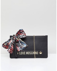 Черный кожаный клатч с принтом от Love Moschino