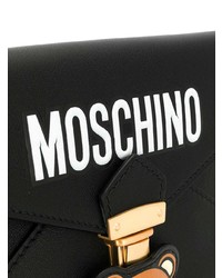 Черный кожаный клатч с принтом от Moschino