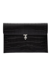 Черный кожаный клатч с украшением от Alexander McQueen
