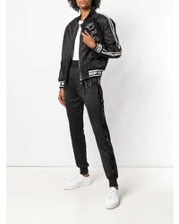 Черный кожаный клатч с украшением от Philipp Plein