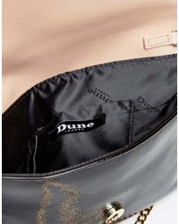 Черный кожаный клатч с шипами от Dune