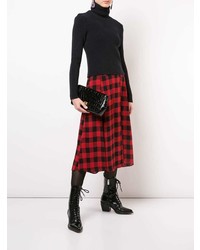 Черный кожаный клатч от Coach