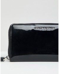 Черный кожаный клатч от Armani Exchange