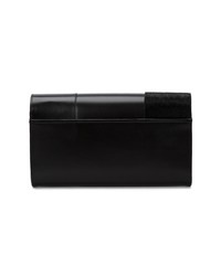 Черный кожаный клатч от Perrin Paris