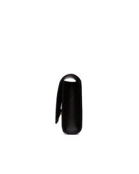 Черный кожаный клатч от Saint Laurent