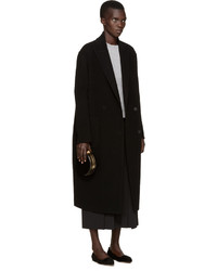 Черный кожаный клатч от Alexander McQueen